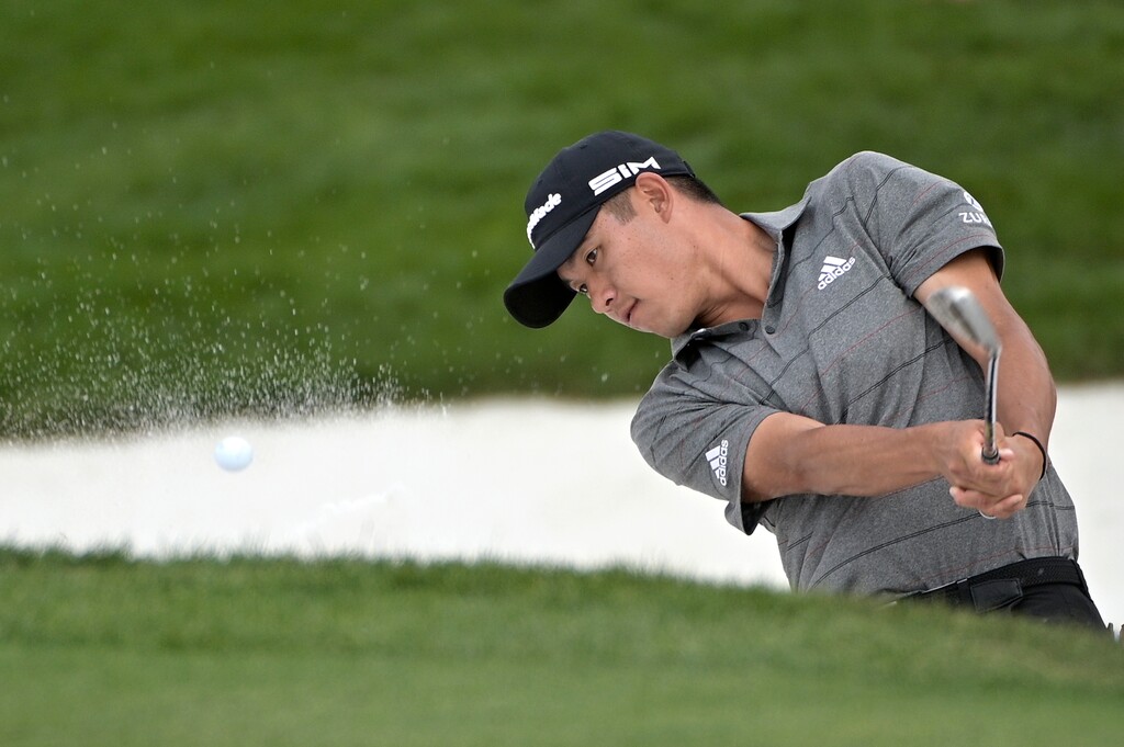 Collin Morikawa, pictured hitting out of a bunker during the final round of the Arnold Palmer Invitational on March 8 in Orlando, Fla., leads the Workday Charity Open by one shot over Adam Hadwin after opening with a 7-under 65 on Thursday in Dublin, Ohio.  (AP Photo/Phelan M. Ebenhack)