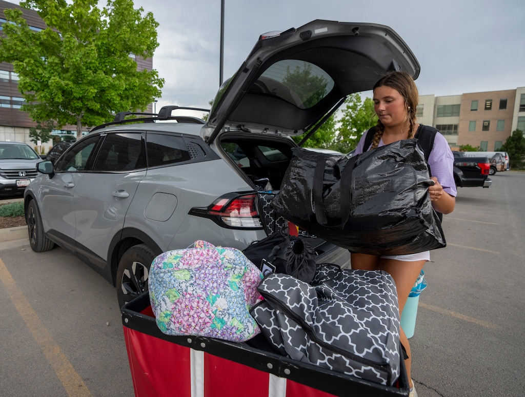 (Rick Egan | The Salt Lake Tribune)  University of Utah student Lauren McCabe from Marietta, Ga., moves her belongings in to the Impact & Prosperity Epicenter student housing on Monday, Aug. 5, 2024.