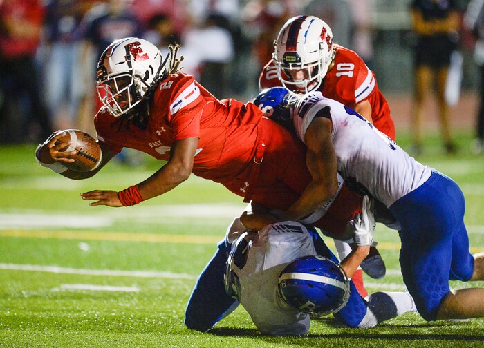 (Francisco Kjolseth  |  The Salt Lake Tribune)  Mekelee Gautavai of East sets his team up for their only touchdown against Bingham as he's stopped at the one yard line on Friday, Aug. 24, 2018 at East. Bingham won 30-8. 
