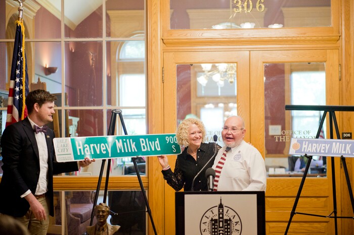 (Rachel Molenda | The Salt Lake Tribune)
Salt Lake City Councilman Chris Wharton, left, and Mayor Jackie Biskupski, center present Nicole Murray-Ramirez with a Harvey Milk Boulevard sign at the Salt Lake City-County Building in Salt Lake City on Friday, May 25, 2018. Salt Lake is the second city in the U.S. to honor the late gay rights activist by naming a street after him, Ramirez said.
