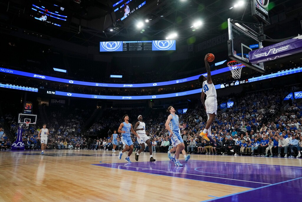 (Bethany Baker  |  The Salt Lake Tribune) BYU Cougars guard Kennard Davis Jr. (30) dunks the ball during the game between the BYU Cougars and the North Carolina Tar Heels at Delta Center on Oct. 24, 2025.