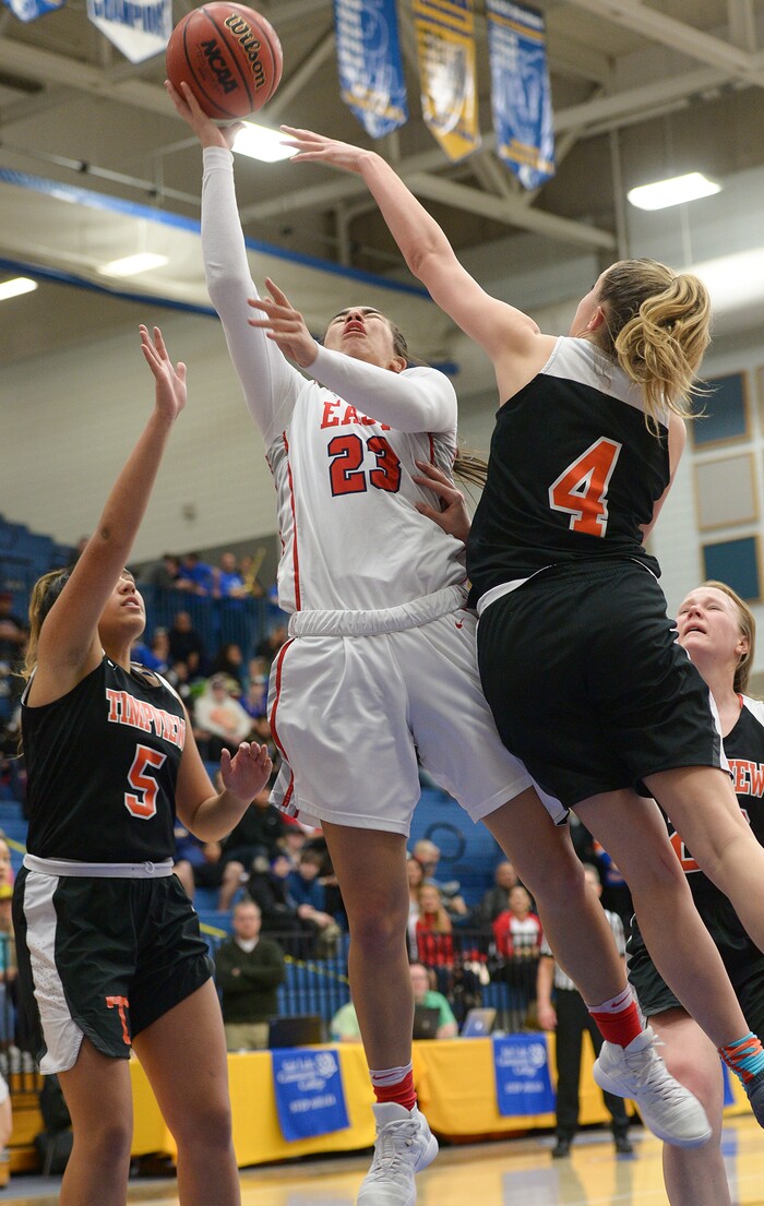 (Leah Hogsten  |  The Salt Lake Tribune)  East's Liana KaituÕu (23) drives to the net. East defeated Timpview 68-48 to win the the 5A High School Girls' Basketball Tournament title at SLCC in Taylorsville, Saturday, Feb. 24, 2018. 