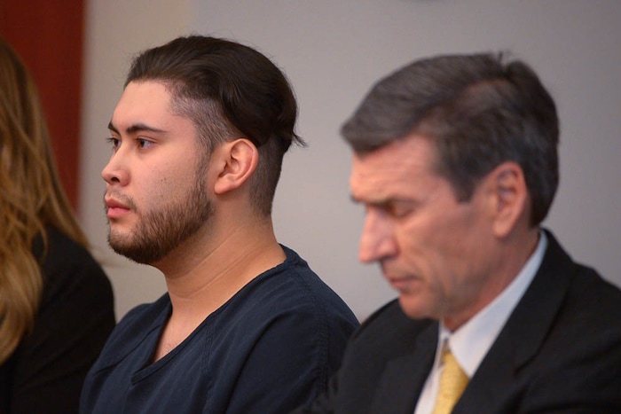(Trent Nelson | The Salt Lake Tribune)  Abraham Miranda at his sentencing in Salt Lake City, Thursday December 21, 2017. Miranda, 19, pleaded guilty to manslaughter counts for a February crash that killed two of his West High School classmates and critically injured a pregnant woman and her baby. At right is Miranda's attorney Greg Skordas.