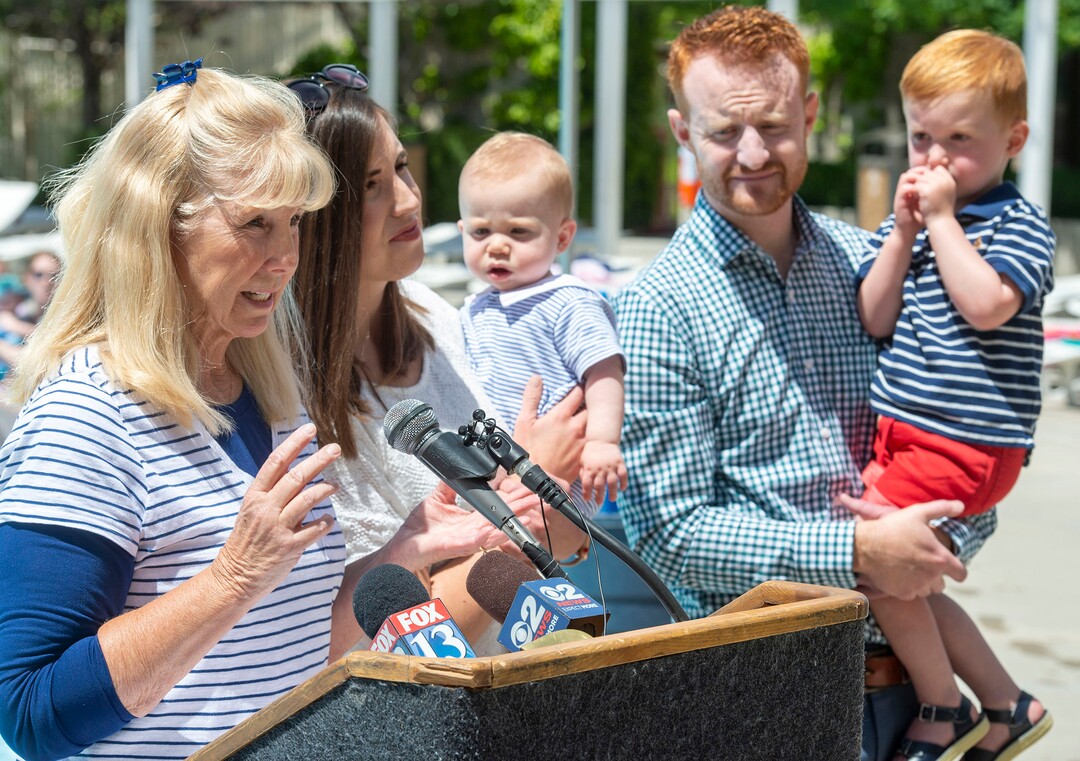 (Rick Egan  |  The Salt Lake Tribune)    Chris Miles talks about how she nearly lost her 2-year-old grandson Nathan Miles, to an accidental drowning, as her daughter Allie, grandson sam, along with Todd Miles and Nathan Miles listen, during a news conference at the Jewish Community Center to promote summer water safety, Friday May 31, 2019