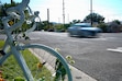 (Chris Samuels | The Salt Lake Tribune) Cars pass by a "ghost bike" memorial on 800 South in Salt Lake City, Thursday, Aug. 27, 2026, for a cyclist killed in a crash on Aug. 25.