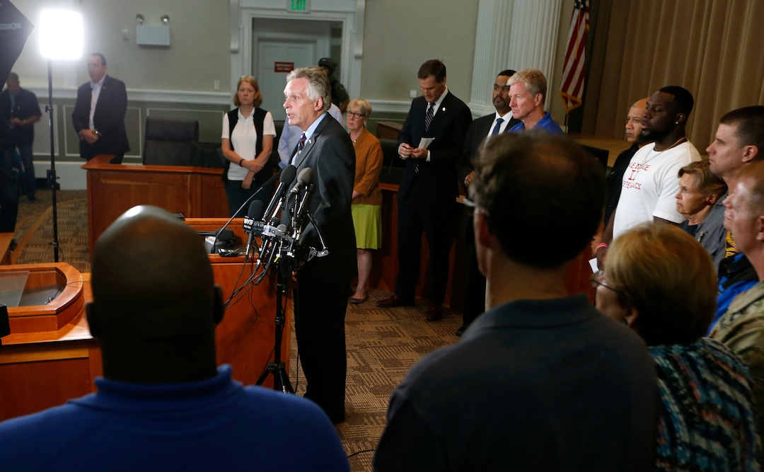 Virginia Gov. Terry McAuliffe addresses a news conference concerning the white nationalist rally and violence in Charlottesville, Va., Saturday, Aug. 12, 2017. (AP Photo/Steve Helber)