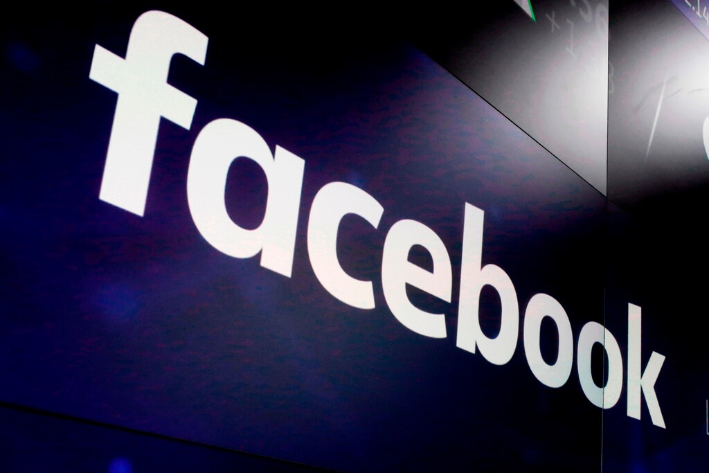 (Richard Drew | AP file photo) In this March 29, 2018, photo, the logo for Facebook appears on screens at the Nasdaq MarketSite in New York's Times Square.