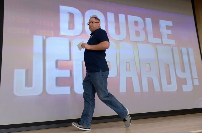 (Scott Sommerdorf | The Salt Lake Tribune)
Real Salt Lake Academy math teacher Steve Mond runs across the stage at the school during the watch party at the school, Friday, May 11, 2018, as they showed his performance in the JEOPARDY! Teachers Tournament.