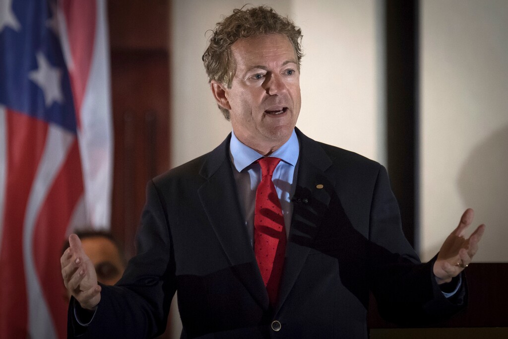 (Bryan Woolston | The Associated Press) In this Aug. 11, 2017 photo, Sen. Rand Paul, R-Ky., speaks to supporters in Hebron, Ky. A man has been arrested and charged with assaulting and injuring Rand Paul. Kentucky State Police said in a news release Saturday, Nov. 4, 2017 that Paul suffered a minor injury when 59-year-old Rene Boucher assaulted him at his Warren County home on Friday afternoon. The release did not provide details of the assault or the nature of Paul's injury. In a statement, Paul spokeswoman Kelsey Cooper said the Republican senator was "fine."