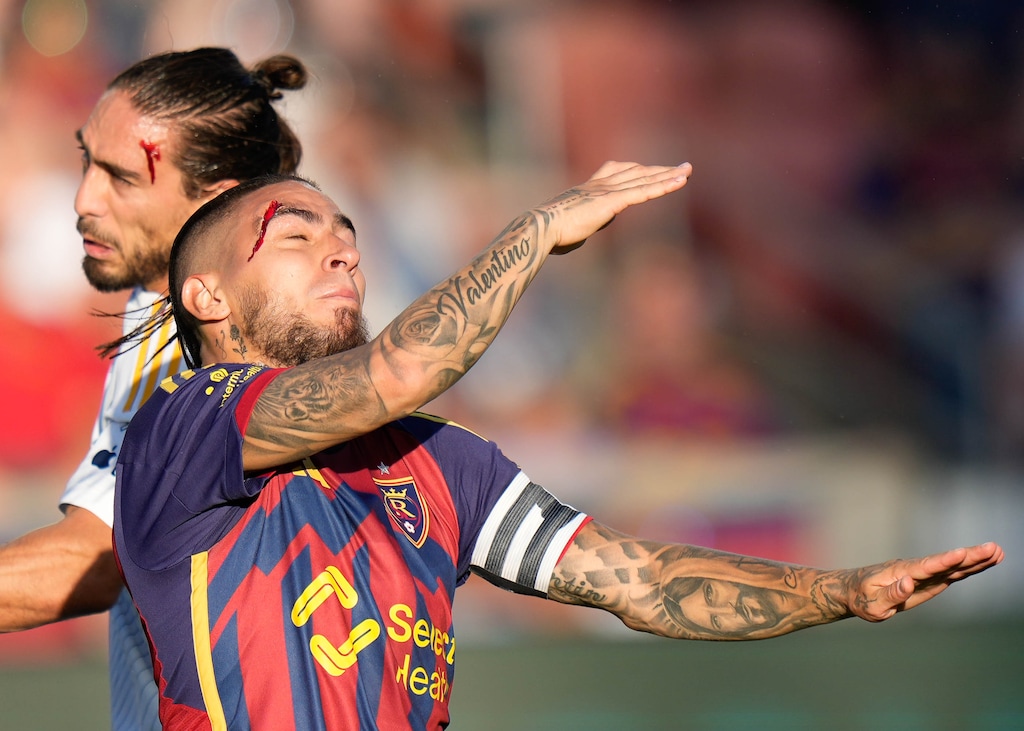 (Francisco Kjolseth | The Salt Lake Tribune) Real Salt Lake forward Chicho Arango (9) collides with Los Angeles Galaxy defender Martín Cáceres (22) as the two end up with bloody head wounds during an MLS soccer match against LA Galaxy on Saturday, June 22, 2024, in Sandy Utah.