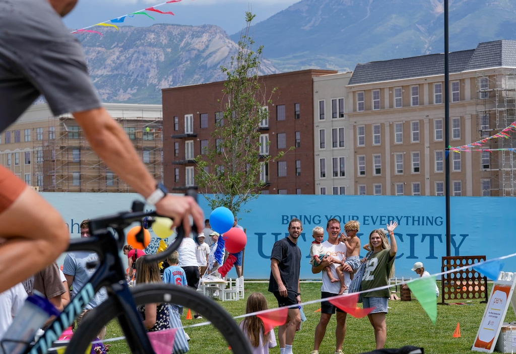 (Francisco Kjolseth | The Salt Lake Tribune) People enjoy a block party at Utah City in Vineyard on Saturday, July 18, 2026. 