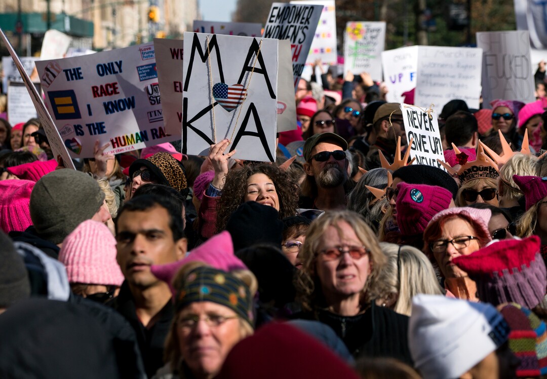 People line up on Central Park West as they wait for the start of a march highlighting equal rights and equality for women Saturday, Jan. 20, 2018, in New York. The New York protest was among more than 200 such actions planned for the weekend around the world. (AP Photo/Craig Ruttle)