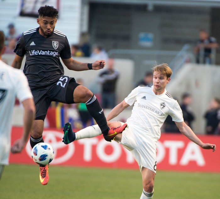 (Rick Egan  |  The Salt Lake Tribune)   Real Salt Lake midfielder Danilo Acosta (25) and Colorado Rapids midfielder Johan Blomberg (8) go for the ball, in MLS soccer action, between Real Salt Lake and Colorado Rapids, at Rio Tinto Stadium, Saturday, April 21, 2018.


