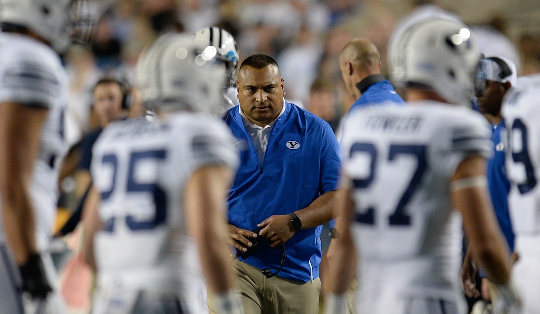 (Francisco Kjolseth  |  The Salt Lake Tribune)  BYU head coach Kalani Sitake gathers his team during the first half of the NCAA college football game, Saturday, Sept. 8, 2018, at LaVell Edwards stadium in Provo, Utah.
