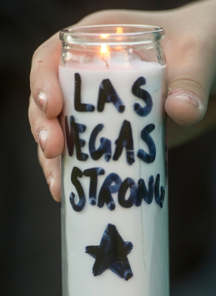 (Rick Egan  |  The Salt Lake Tribune)  Southern Utah University studentMackayla Mumford holds a candle during a candle light vigil for the victims of the Las Vegas shooting, on the SUU campus in Cedar City, Wednesday, October 4, 2017.