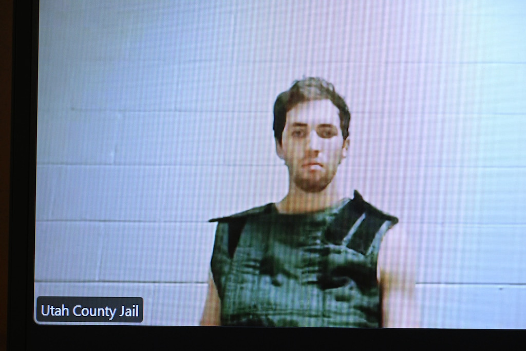(Scott G. Winterton | Pool) Tyler Robinson, 22, the suspect in the shooting death of Charlie Kirk, appears by camera before Judge Tony Graf in Utah's 4th District Court on Tuesday, Sept. 16, 2025 for his initial appearance.