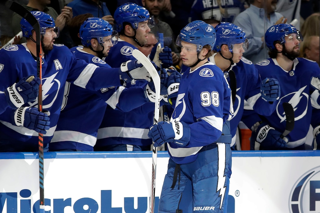 Tampa Bay Lightning defenseman Mikhail Sergachev (98) celebrates with the bench after his goal against the Pittsburgh Penguins during the first period of an NHL hockey game Thursday, Feb. 6, 2020, in Tampa, Fla. (AP Photo/Chris O'Meara)