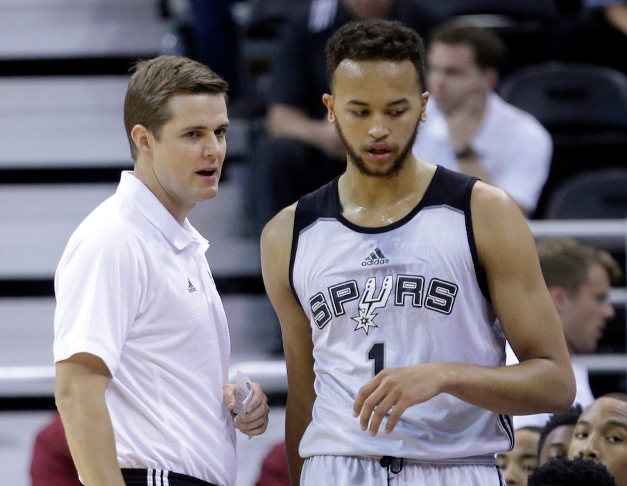 (Rick Bowmer | AP) Then serving as the San Antonio Spurs summer league coach, Will Hardy speaks with Kyle Anderson during a game in July of 2015 in Salt Lake City. Hardy is now an assistant coach with the Boston Celtics.