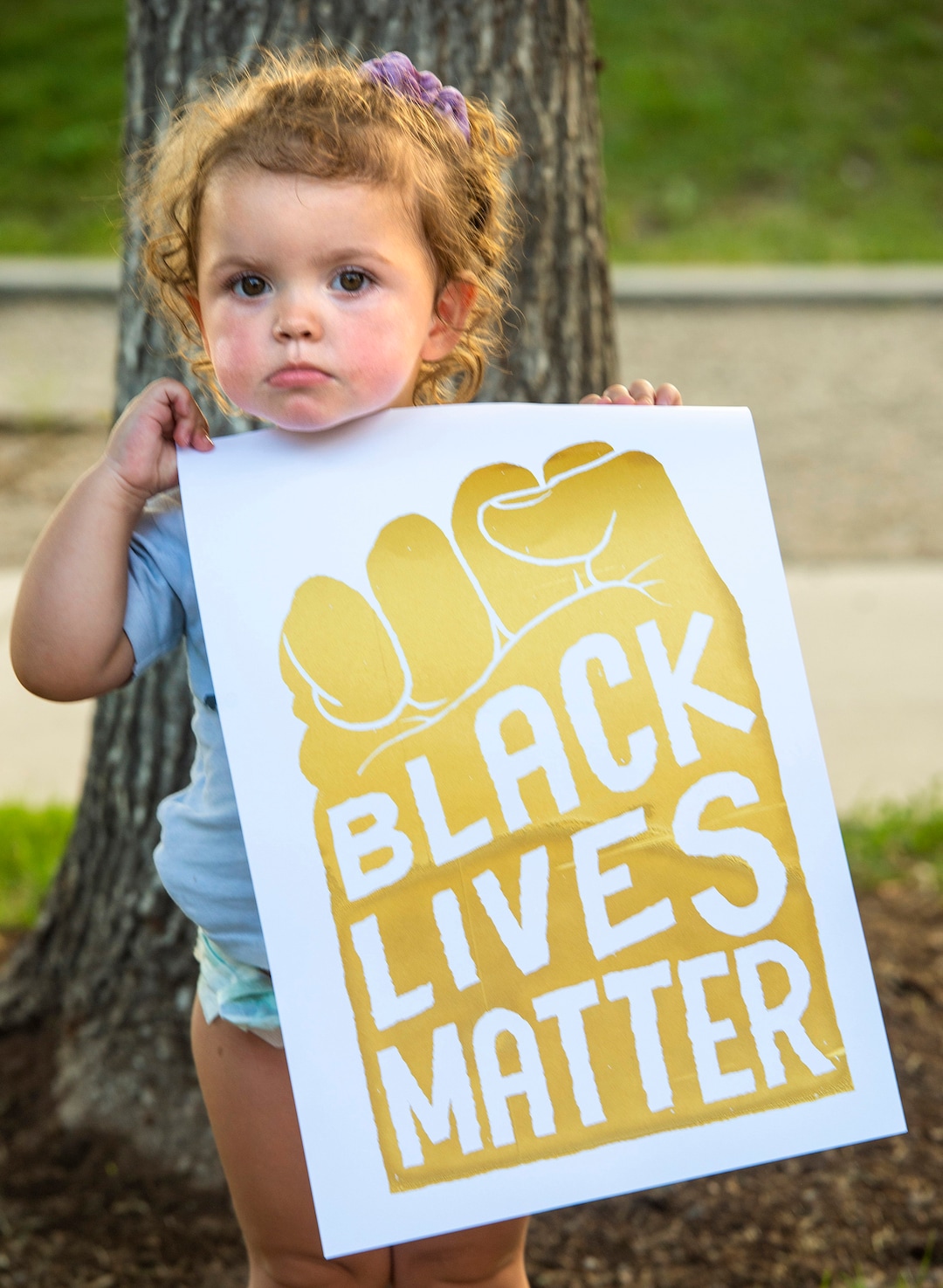 (Rick Egan  |  The Salt Lake Tribune)    Sophie Marquez, joins protesters across from the Salt Lake Public Safety Building during a Justice for Bernardo protest on Wednesday, June 24, 2020.