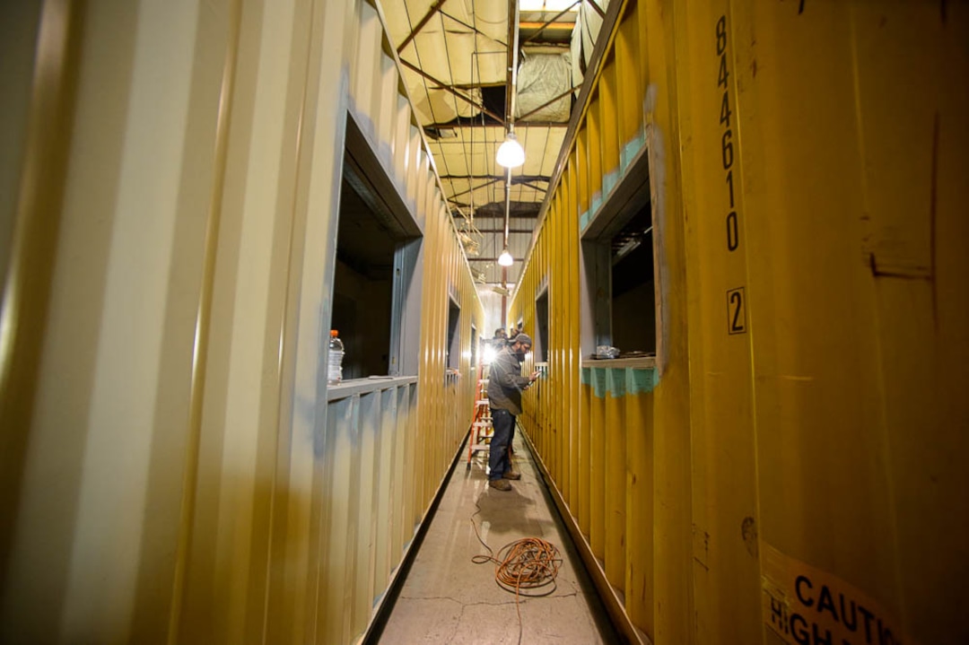 (Trent Nelson | The Salt Lake Tribune)Eco Box Fabricators, based in Salt Lake City, hopes to make viable affordable housing out of discarded shipping containers. Tuesday Jan. 15, 2019. Tyler Marberger working on a unit.