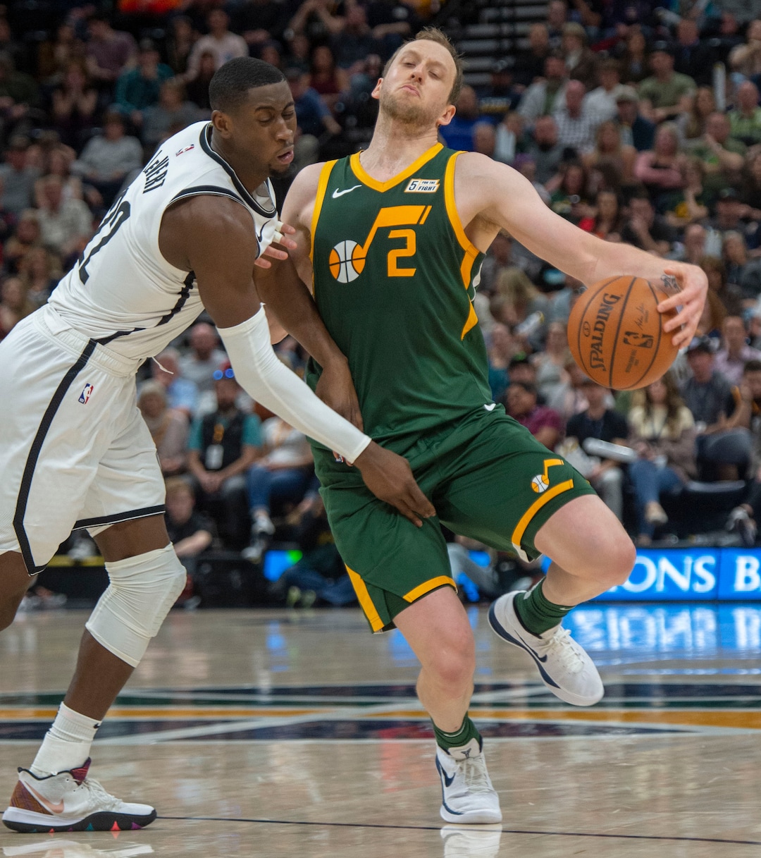 (Rick Egan  |  The Salt Lake Tribune)  Utah Utah Jazz forward Joe Ingles (2) gets called for an offensive foul as he comes in contact with Brooklyn Nets guard Caris LeVert (22), in  NBA action between Utah Jazz and Brooklyn Nets at Vivint Smart Home Arena, Saturday, March 17, 2019.
