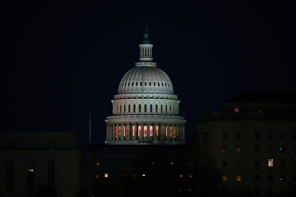 (Kenny Holston | The New York Times) The U.S. Capitol before dawn in Washington on Tuesday, Jan. 14, 2025. Elected officials in Utah are warning about the harm that could result from banning AI regulation for ten years.