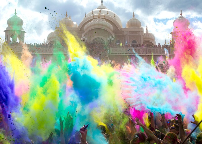 (Rick Egan  |  The Salt Lake Tribune)     Colors fly during the 22nd annual Holi Festival of Colors at the Sri Sri Radha Krishna Temple in Spanish Fork, Saturday, March 24, 2018.