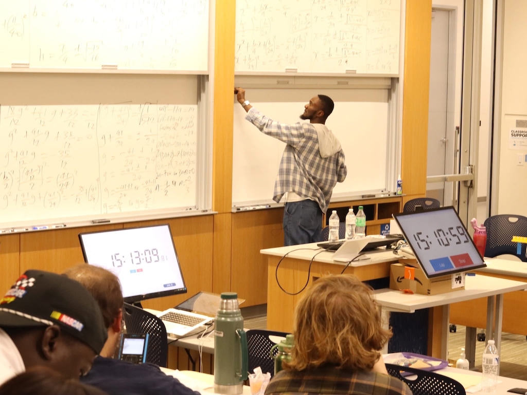 (Utah State University) Pictured is Utah State University doctoral student Emmanuel Onyegu while teaching a math class for more than 40 hours, trying to break a world record, starting on Nov. 21, 2025.