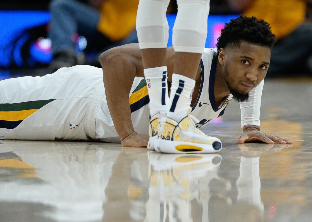 (Francisco Kjolseth  |  The Salt Lake Tribune) Utah Jazz guard Donovan Mitchell (45) lingers on the floor after losing the ball as the Utah Jazz host the Denver Nuggets in their NBA basketball game at Vivint Smart Home Arena in Salt Lake City on Wednesday, Feb. 5, 2020.