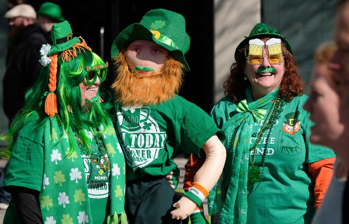 (Francisco Kjolseth | The Salt Lake Tribune) Terrie Orton, left, and JoAnn Langenegger join the fun from the sidelines as Salt Lake CityÕs Irish community celebrates their 41st annual St. PatrickÕs Day Parade with crowds lining up to take in the festivities. Marching bands, Irish dancers, bagpipes and a sea of green moved along 200 South, starting at 500 East Saturday morning en route to State street where the Siamsa festivities kept the fun going at the Gallivan Center.