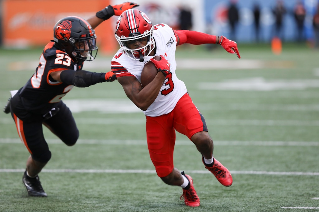 (Amanda Loman | The Associated Press) Utah wide receiver Demari Simpkins (3) dodges a tackle from Oregon State defensive back Isaiah Dunn (23) during the first half of an NCAA college football game in Corvallis, Ore., Saturday, Oct. 12, 2019.