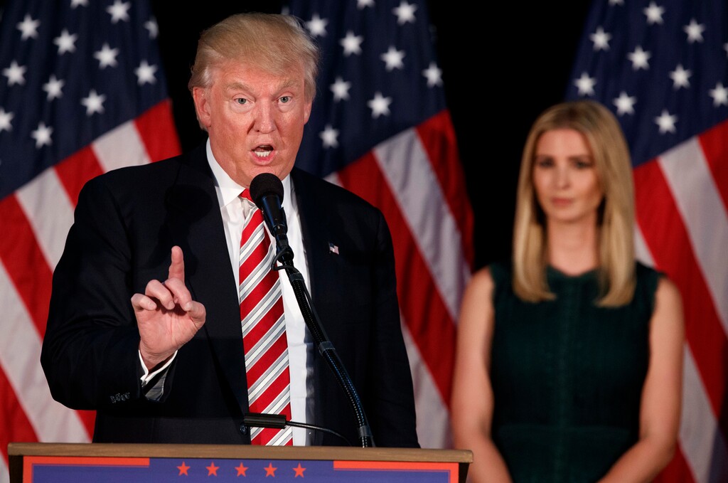 Ivanka Trump, right, watches as her father Republican presidential candidate Donald Trump delivers a policy speech on child care, Tuesday, Sept. 13, 2016, in Aston, Penn. (AP Photo/Evan Vucci)