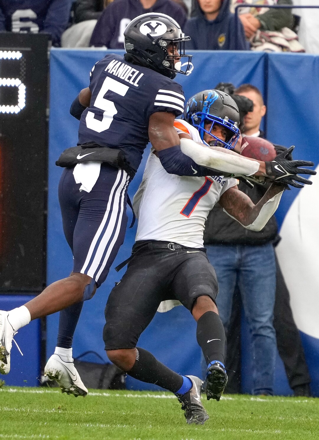 (Leah Hogsten | The Salt Lake Tribune) Boise State Broncos wide receiver Octavius Evans (1) pulls in the pass defended by Brigham Young Cougars defensive back D'Angelo Mandell (5) as No. 10 Brigham Young University hosts Boise State at LaVell Edwards Stadium, Oct. 9, 2021.