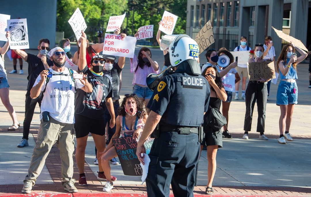 (Rick Egan  |  The Salt Lake Tribune) Protesters face off with the Salt Lake City Police, who threatened to arrest anyone who stepped off of the sidewalk during a Justice for Bernardo Palacios march in Salt Lake City on Tuesday, June 23, 2020.