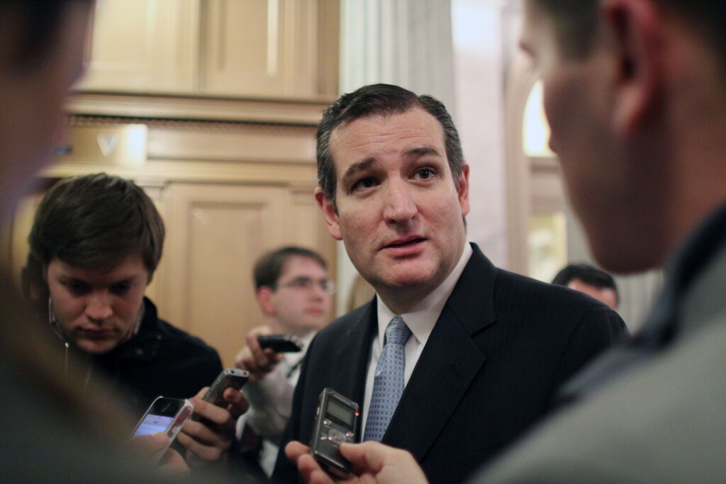FILE - In this Dec. 13, 2014 file photo, Sen. Ted Cruz, R-Texas talks with reporters on Capitol Hill in Washington. Unhappy Republicans say Sen. Ted Cruz of Texas left a gift certificate good for confirmation of 12 judicial appointments for President Barack Obama and Democrats this holiday season. Only a month or so ago, voters delivered them a lump of coal in mid-term elections. (AP Photo/Lauren Victoria Burke, File)