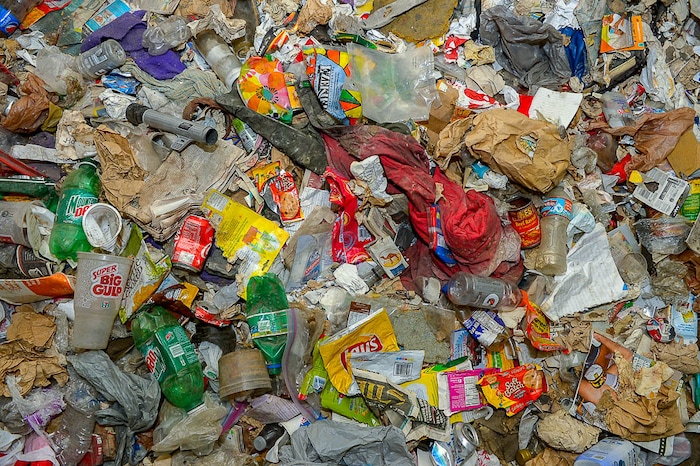 (Trent Nelson | The Salt Lake Tribune) Garbage from squatters fills the basement of a dilapidated, fire-damaged building near 100 South 700 East in Salt Lake City, Thursday Feb. 15, 2018. Other Side Academy has received approval to demolish it for their expansion.