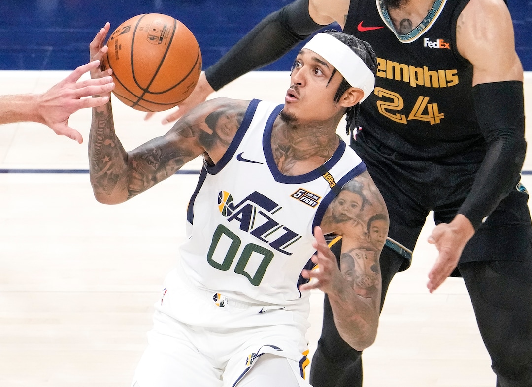 (Leah Hogsten | The Salt Lake Tribune)  Utah Jazz guard Jordan Clarkson (00) is pressured by Memphis Grizzlies center Jonas Valanciunas (17) and Memphis Grizzlies forward Dillon Brooks (24) as the Utah Jazz take on the Memphis Grizzlies during Game 1 of the first-round playoffs at Vivint Arena, May 23, 2021.