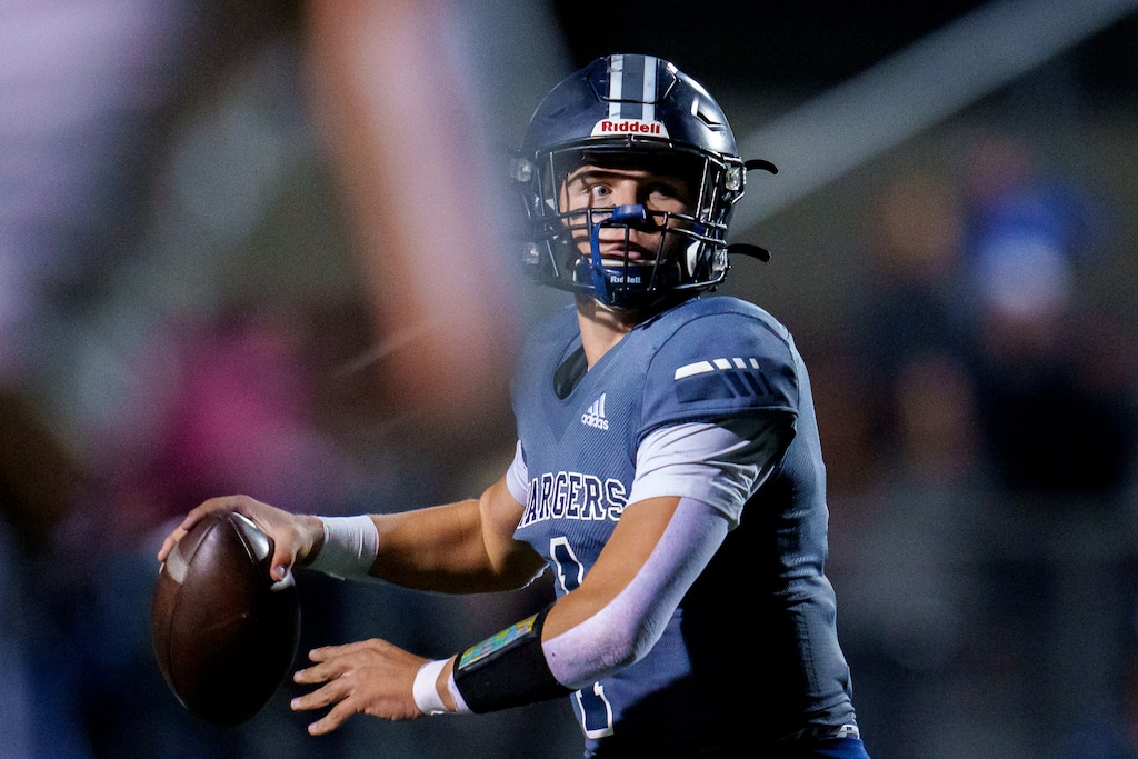 (Trent Nelson  |  The Salt Lake Tribune) Corner Canyon quarterback Isaac Wilson in action vs Pleasant Grove, in Draper on Wednesday, Oct. 12, 2022.