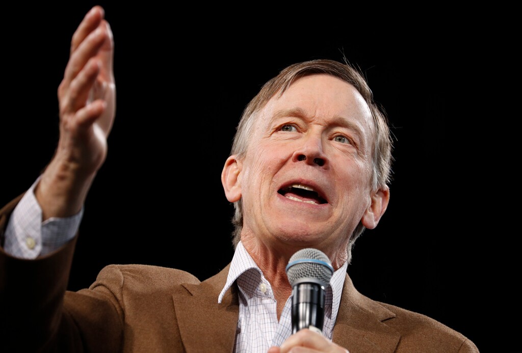 FILE - In this April 27, 2019, file photo, Democratic president candidate and former Colorado Gov. John Hickenlooper speaks at a Service Employees International Union forum on labor issues in Las Vegas. Hickenlooper has become the latest Democratic presidential hopeful to call for impeachment proceedings against President Donald Trump. (AP Photo/John Locher, File)