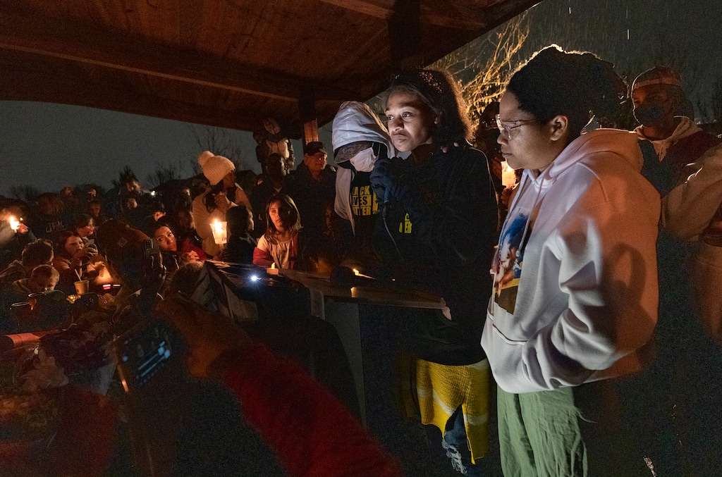 (Leah Hogsten | The Salt Lake Tribune) Brittany Tichenor-Cox, center, joined by her sister Jasmine Rhodes, right, speaks about her daughter Izzy Tichenor, Nov. 9, 2021. Hundreds joined the Tichenor family in mourning the death of 10-year-old Isabella "Izzy" Tichenor during a vigil at Foxboro Hollow Park in North Salt Lake on Tuesday.