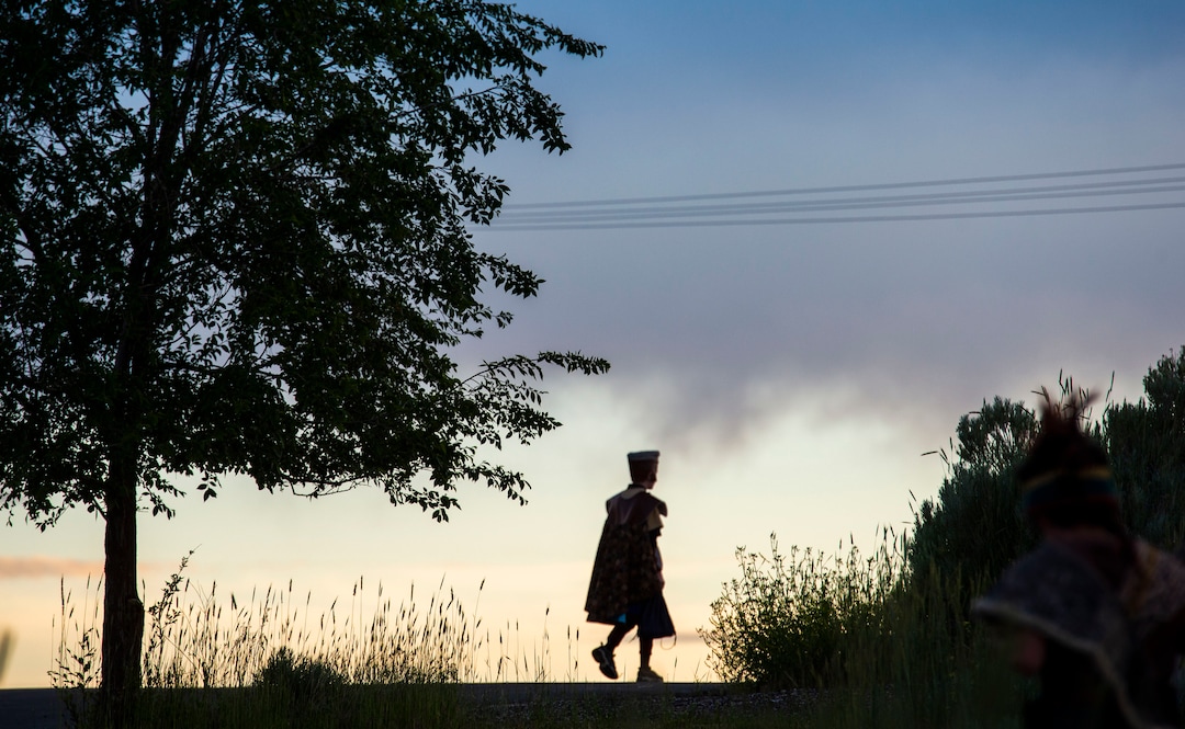 (Rick Egan  |  The Salt Lake Tribune)   A soldier makes his way to the hill, before the Mormon Miracle Pageant gets underway June 12, 2019, during the dress rehearsal.  The final run for the pageant continues through Saturday, June 22.