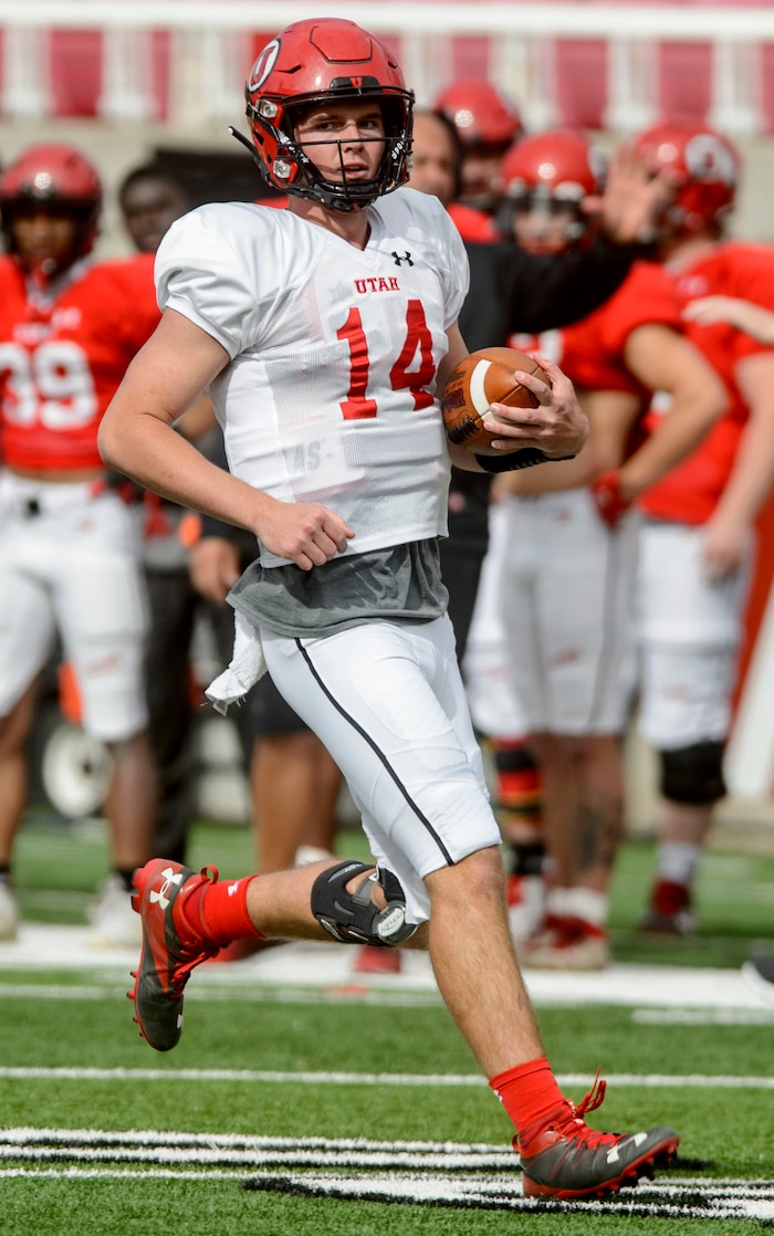 (Steve Griffin  |  The Salt Lake Tribune) Utah quarterback Jack Tuttle runs the ball during the University of Utah football team's first scrimmage at Rice-Eccles Stadium in Salt Lake City Friday March 30, 2018.