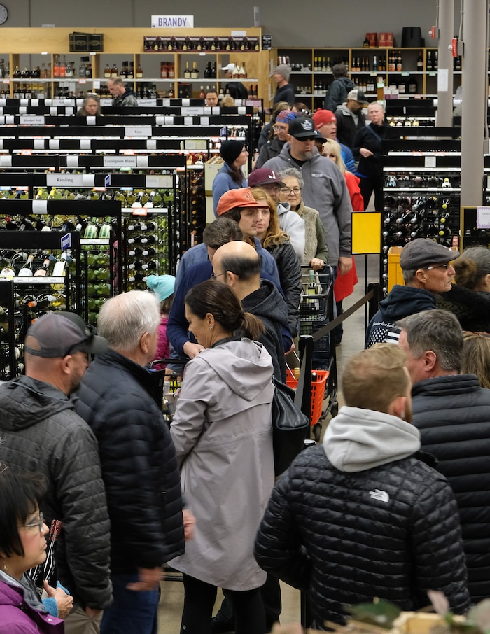 (Francisco Kjolseth | The Salt Lake Tribune) The day before Thanksgiving is the busiest day of the year at Utah's state-run liquor stores, and the store in Cottonwood Heights at 1863 E. Fort Union Blvd., makes the most sales in the state, as long lines form inside the store.