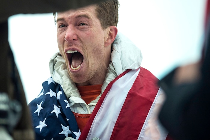 (Chris Detrick  |  The Salt Lake Tribune)  Shaun White reacts to seeing his friends and family after winning gold after his run during the men's halfpipe finals at Phoenix Snow Park during the Pyeongchang 2018 Winter Olympics Wednesday, Feb. 14, 2018.  White won the event with a 97.75, his third Olympic gold medal in the halfpipe (2006, 2010, 2018).