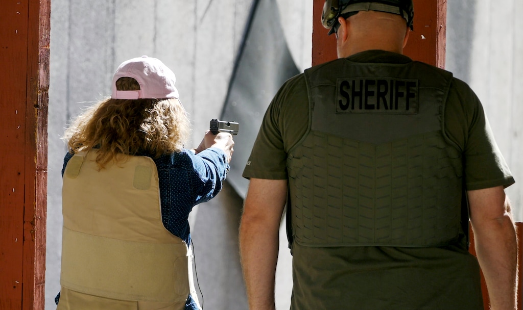 (Rick Bowmer | AP Photo) Cindy Bullock, a secretary at Timpanogos Academy, participates in shooting drills at the Utah County Sheriff's Office shooting range during a training for teachers and educators on Saturday, June 29, 2019. The Utah Legislature passed a bill that aims to provide teachers with free classroom-threat response training to encourage more educators to carry guns.