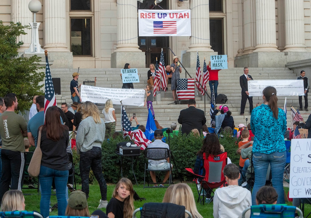 (Rick Egan  |  The Salt Lake Tribune)     Several people carried guns, but no one was wearing masks, as a couple of hundred people gather at the Provo Courthouse for the Utah County Freedom Rally on Friday, Oct. 2, 2020.