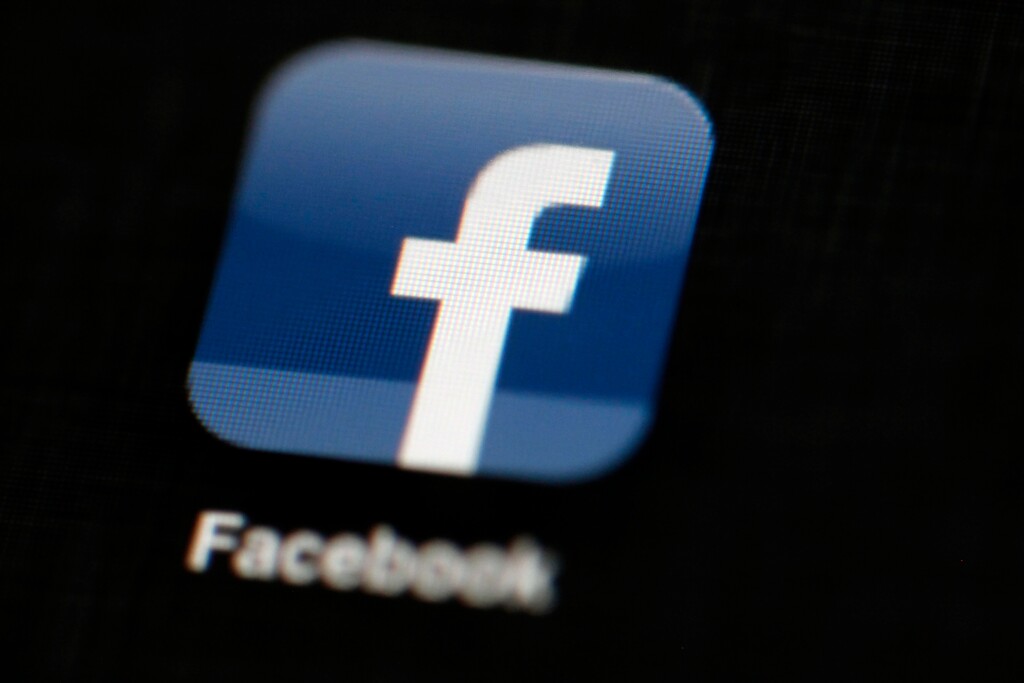FILE - In this May 16, 2012, file photo, the Facebook logo is displayed on an iPad in Philadelphia. Facebook is announcing its second major tweak to its algorithm this month, saying it will prioritize news based on users’ votes. The company said in a blog post and Facebook post from Facebook CEO Mark Zuckerberg Friday, Jan. 19, 2018, that it will survey users about how familiar they are with a news source and if they trust it. (AP Photo/Matt Rourke, File)