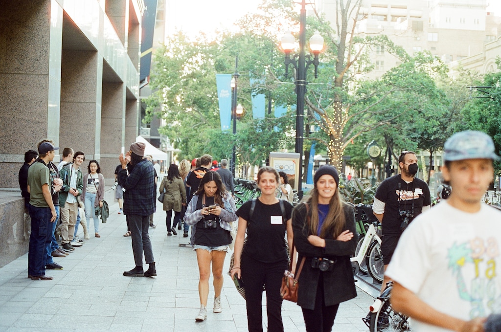 (Darío Gòmez) A photo of the Salt Lake Photo Community, taken by the group's organizer, Dario Gómez, during a walk on downtown Salt Lake City's Main Street. The group meets periodically to take walks around parts of the city, to take pictures and hang out.