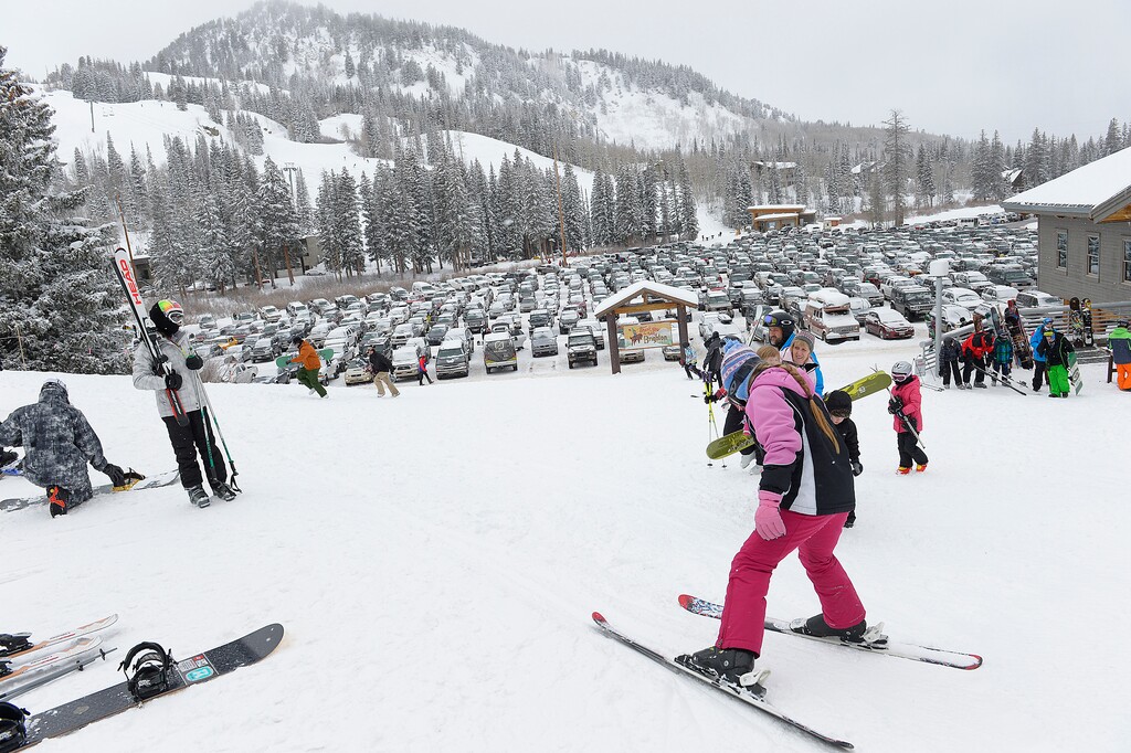 Scott Sommerdorf   |  The Salt Lake Tribune
The parking lot was packed at Brighton Ski Resort, Saturday December 21, 2013. Parking has only grown in demand in the past 10 years, leading to the resort announcing it would require reservations this season. On Thursday, Dec. 14, 2023, it announced those reservations would only be necessary on weekends and holidays.