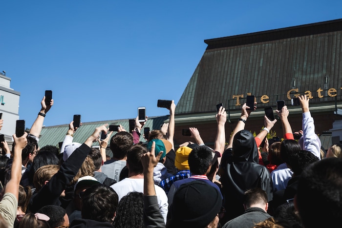 (Clark Clifford  |  Special to The Salt Lake Tribune) Dozens of phones being held as high as possible for a better look of Kanye West during his Sunday Service at The Gateway in Salt Lake City on Saturday, Oct. 5, 2019.
